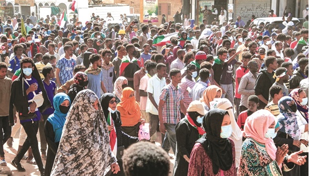 Protesters march during a mass demonstration demanding civilian rule, in the Sahafa neighbourhood in the south of Sudanu2019s capital Khartoum, yesterday.