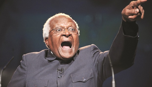 Archbishop Desmond Tutu gestures as he delivers a speech during a conference for u201cOne Young Worldu201d, the Worldu2019s largest gathering of Young Leaders, in London in 2010. (AFP)