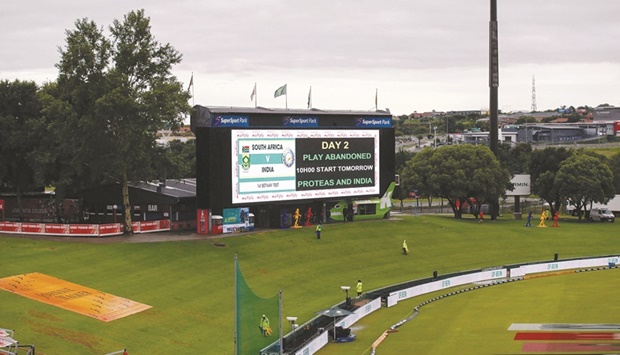 A digital board displays a message that play has been abandoned due to rain during the Day 2 of the first Test between South Africa and India at SuperSport Park in Centurion yesterday. (AFP)