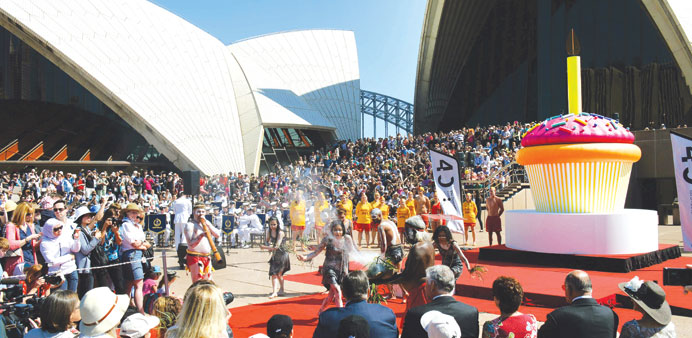 Aboriginal dancers perform a smoking ceremony on the steps of the Sydney Opera House as the world heritage icon celebrated its 40th u2018birthdayu2019 yesterd