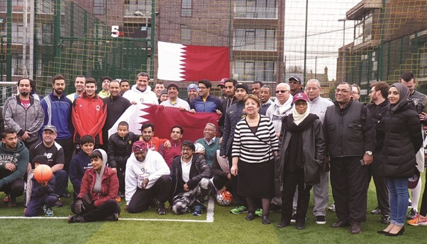 Qatar ambassador to the UK, Yousef Ali al-Khater, with the embassy staff, diplomats and students during the National Sport Day celebrations in London.