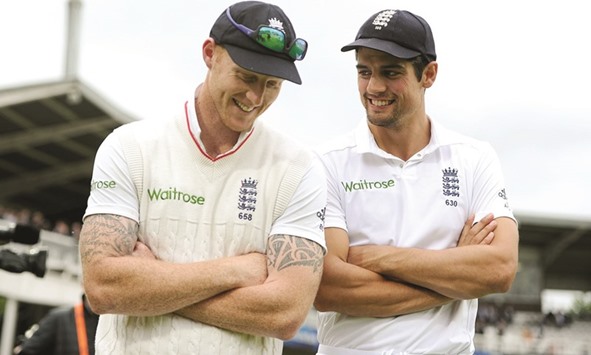 Alastair Cook (R) with Ben Stokes.