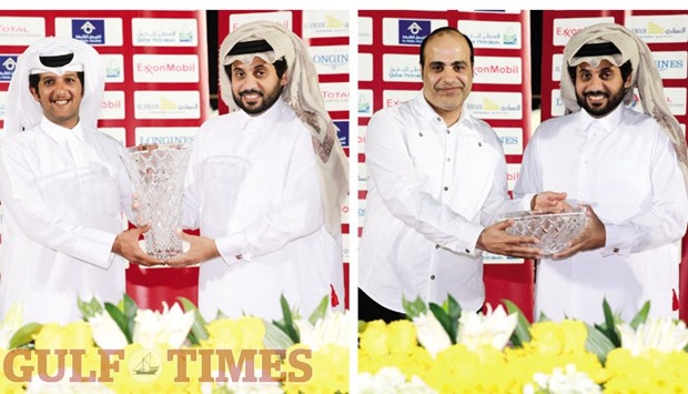 Qatar Racing and Equestrian Club (QREC) general manager Nasser Sherida al-Kaabi (right) gives the owneru2019s trophy to Al Murqab Stud representative Ali al-Mehshadi after Pearl Bridge won the Wathnan Cup at QREC yesterday. RIGHT: Qatar Racing and Equestrian Club (QREC) general manager Nasser Sherida al-Kaabi (right) gives the traineru2019s trophy to Zuhair Mohsen. PICTURES: Juhaim