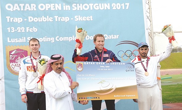 USAu2019s Casey Wallace (centre) won the menu2019s Trap gold ahead of Russiau2019s Nikita Egorovat (left) and UAEu2019s Hamad Alkendi at the Lusail Shooting Range yesterday. PICTURE: Nasar TK