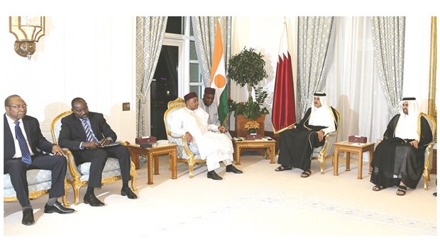 HH the Emir Sheikh Tamim bin Hamad al-Thani and President of Niger Mahamadou Issoufou holding official talks at the Emiri Diwan yesterday. HH the Deputy Emir Sheikh Abdullah bin Hamad al-Thani also attended the session.