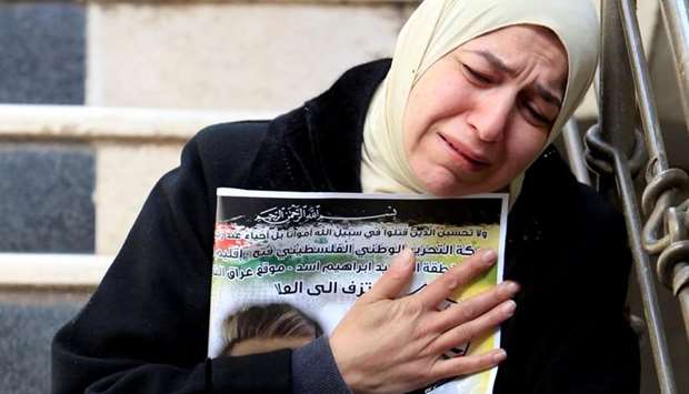 A relative reacts during the funeral of Palestinian Khaled Taeh in Nablus in the occupied West Bank February 7, 2018. He was shot dead during a raid by Israeli forces searching for the assailant who killed an Israeli man at the entrance to a nearby settlement on Monday.