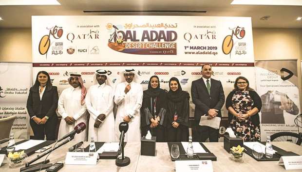 Organisers and sponsors of the Al Adaid Desert Challenge pose after a press conference yesterday.