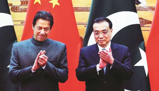 Pakistan Prime Minister Imran Khan (left) with Chinese Premier Li Keqiang. Pakistan and China are set to ink much-awaited second free trade agreement by June 2019 and to this effect a technical expertsu2019 delegation from Islamabad will leave for China by end of February, a top official said yesterday.