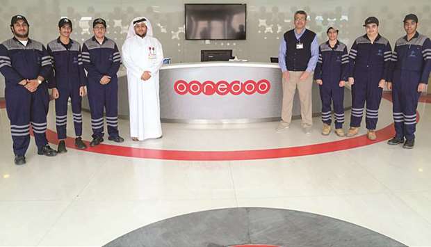 Students from Qatar Independent Technical School at the Ooredoo Qatar Data Centre.