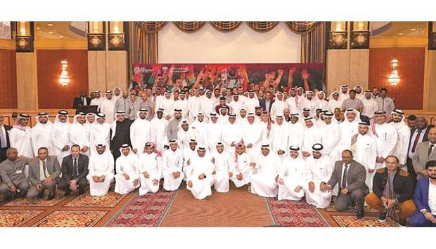 Qatar Football Federation officials, players and support staff pose at the reception and luncheon held for the Asian Cup-winning team yesterday.