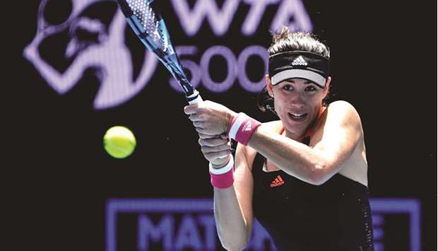 Spainu2019s Garbine Muguruza hits a return against Czech Republicu2019s Marketa Vondrousova during their Yarra Valley Classic semi-final in Melbourne yesterday.