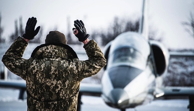 This handout picture taken and released by press-service of Ministry of Defence Ukraine shows the plane of air tactical aviation brigade of Ukraine prior flights in Myrhorod region on February 11, 2022.