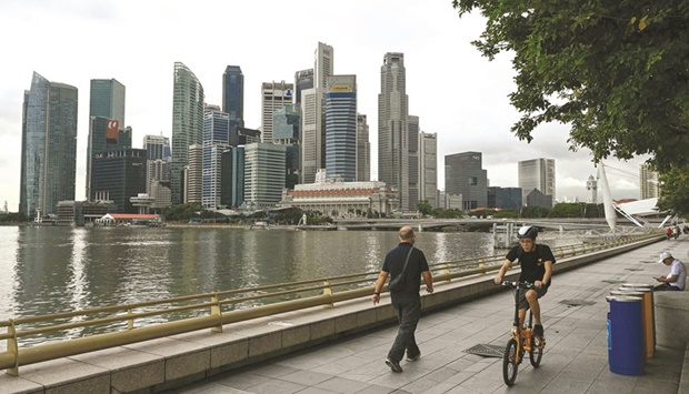 A general view of the financial business district in Singapore. The plan to bring in enough clean energy from overseas to meet 30% of its needs by 2035 has already hit a snag.