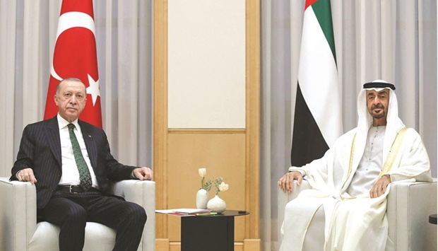 Turkish President Recep Tayyip Erdogan meets with the Crown Prince of Abu Dhabi Mohamed bin Zayed al-Nahyan during an official ceremony in Abu Dhabi.