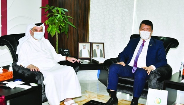 Qatar Chamber board member Mohamed bin Ahmed al-Obaidly and IFOS general director Professor Yerian A Baidaulet, during a meeting in Doha.