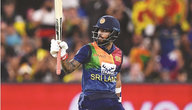 Sri Lankau2019s Kusal Mendis celebrates after scoring half-century against Australia in the fifth T20I at the MCG yesterday. (AFP)