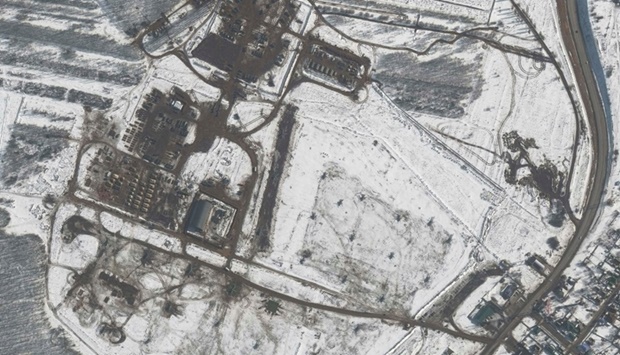 A satellite image shows an overview of a helicopter deployment, a battle group, and troops, in Valuyki, Russia on February 20. Maxar Technologies/Handout via REUTERS