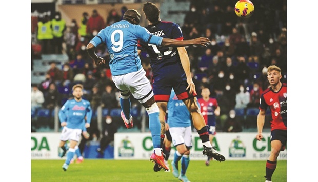 Napoliu2019s Victor Osimhen scores against Cagliari during the Serie A match on Monday night. (Reuters)