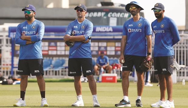 India captain Rohit Sharma (left), coach Rahul Rahul Dravid (second from left), batting coach Vikram Rathore and pacer Jasprit Bumrah (right) during a training session in Lucknow yesterday.