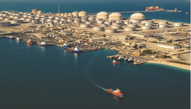 The Saudi Aramco file handout photo shows its oil and gas facilities in Dhahran. Saudi Arabiau2019s sovereign wealth fund has kicked off discussions about how to monetise its roughly $90bn stake in the worldu2019s largest energy company as it seeks to raise funds for ambitious investment goals, people familiar with the matter said.