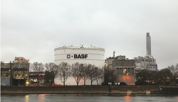 The logo of BASF seen on a storage tank at the companyu2019s plant in Ludwigshafen, Germany. A growing list of companies including BASF are warning the energy crisis will keep hacking away at their bottom lines for the foreseeable future.