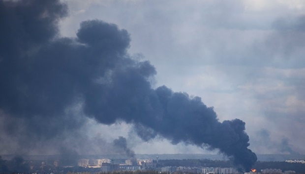 Smoke rising after shelling on the outskirts of the city is pictured from Kyiv, Ukraine February 27. REUTERS/Mykhailo Markiv