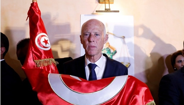 Tunisian presidential candidate Kais Saied reacts after exit poll results were announced in a second round runoff of the presidential election in Tunis, Tunisia. File photo: October 13, 2019. REUTERS