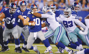 Photo: Dallas Cowboys Tony Romo is sacked by New York Giants Jason