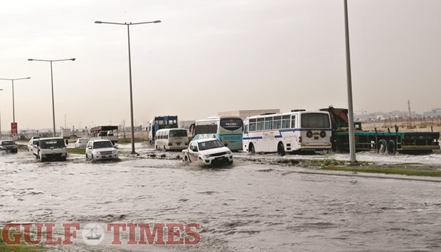 Vehicles caught in severe flooding near Barwa City in Mesaimeer yesterday. PICTURE: Jayaram