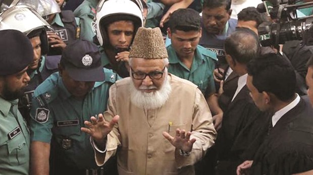 Jamaat-e-Islami leader Motiur Rahman Nizami being escorted by police in this file photo.