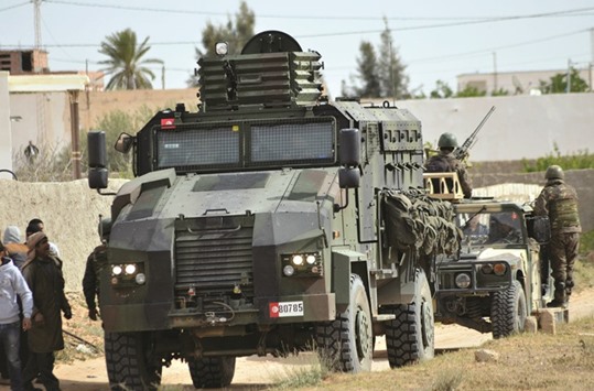 Tunisian special forces prepare to patrol in the southern town of Ben Guerdane, near the Libyan border.