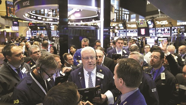 Traders work on the floor of the New York Stock Exchange. Financial leaders from the worldu2019s biggest economies found common ground on foreign exchange at a G20 meeting on Saturday but failed to agree on trade, highlighting a global shift towards protectionism and setting a cautious tone for financial markets this week.