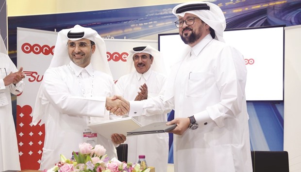 Ooredoo Qatar CEO Waleed al-Sayed and Qatar Rail CEO Engineer Abdulla al-Subaie shake hands after signing the agreement in the presence of HE the Minister of Transport and Communications Jassim Seif Ahmed al-Sulaiti.