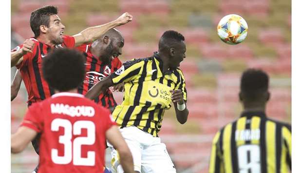 File photo of Gonzalo Vieira (left) of Qataru2019s Al Rayyan vying for the ball against Moufak Ahmed (centre) of Saudi Arabiau2019s Al Ittihad during their AFC Champions League football match at the King Abdullah sports city in Jeddah on March 4. Al Rayyan, who lost that match, will take on Lokomotiv of Uzbekistan today hoping for a turnaround in fortunes.