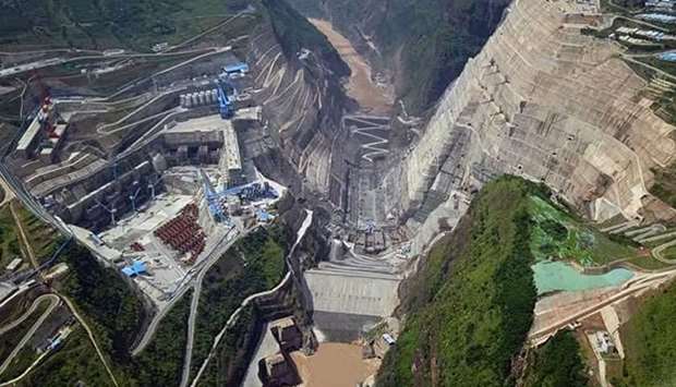 Construction began on the main structure of a 2.24-GW hydropower station on the Jinsha River