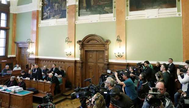 Members of the media are seen before a trial of the Ukrainian captain of a Swiss cruise liner, charged with gross negligence leading to mass casualties after his ship collided with a tourist boat on the river Danube last May, killing 28 people, Budapest, Hungary