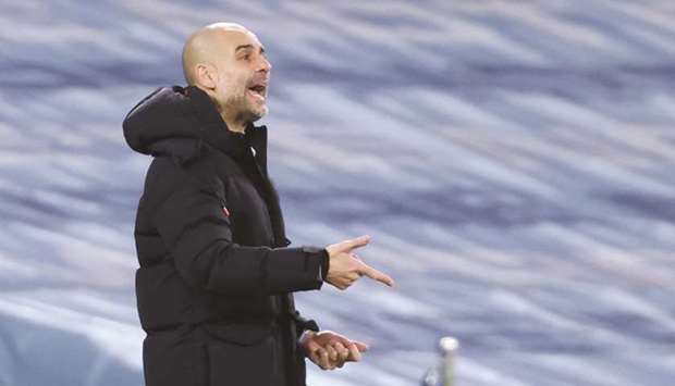 Manchester City manager Pep Guardiola gestures during the Premier League match against Southampton at Etihad Stadium in Manchester, United Kingdom, on Wednesday. (Reuters)