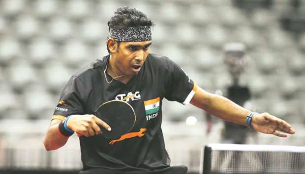 Indiau2019s Achanta Sharath Kamal in action during the Asian Olympic Qualification Tournament at the Ali Bin Hamad Al Attiya Arena yesterday. PICTURE: ITTF / Remy Gros.]     Indiau2019s Achanta Sharath Kamal in action during the Asian Olympic Qualification Tournament at the Ali Bin Hamad Al Attiya Arena on Thursday. PICTURE: ITTF / Remy Gros.