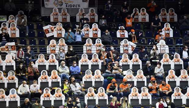 People attend a volleyball game after taking Covid-19 tests in Berlin