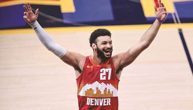 Denver Nuggets guard Jamal Murray celebrates after their win over the Philadelphia 76ers at Ball Arena in Denver. (USA TODAY Sports)