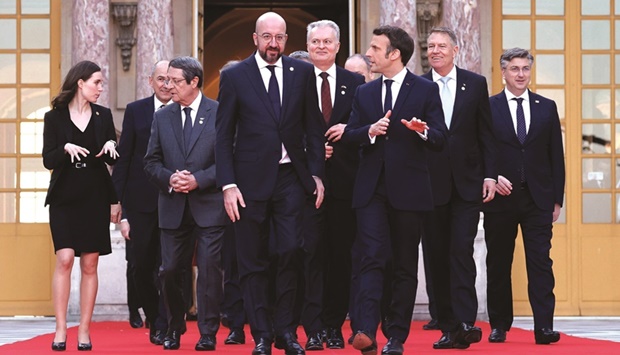 Franceu2019s President Emmanuel Macron and EU leaders arrive at the Palace of Versailles, near Paris, yesterday, prior to the EU leaders summit to discuss the fallout of Russiau2019s invasion in Ukraine. EU leaders are scrambling to find ways to urgently address the fallout of Russiau2019s invasion of Ukraine that has imperilled the blocu2019s economy and exposed a dire need for a stronger defence.