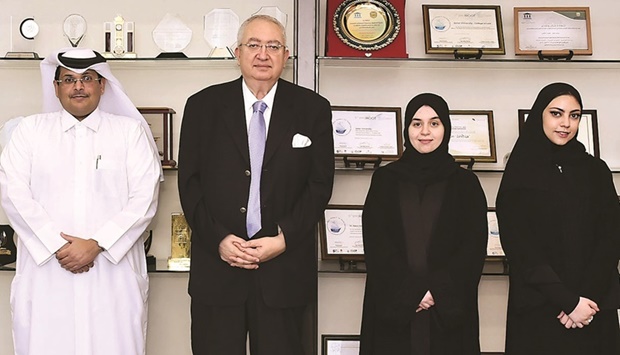 QU College of Law officials