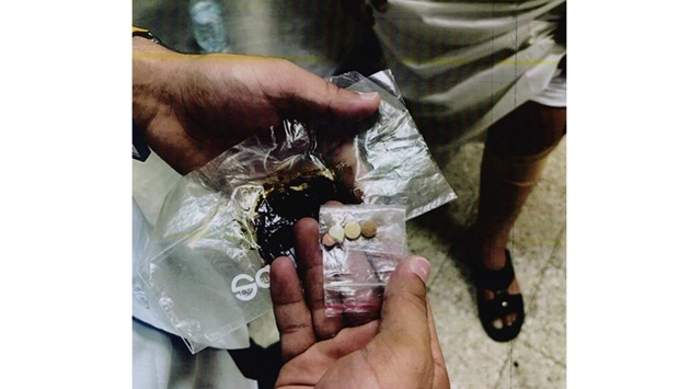 Some suspected passengers were inspected and hashish weighing 13.49gm was found along with narcotic pills, the General Authority of Customs tweeted on Tuesday.?