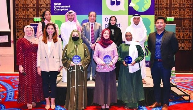 The participants with officials at the ceremony.