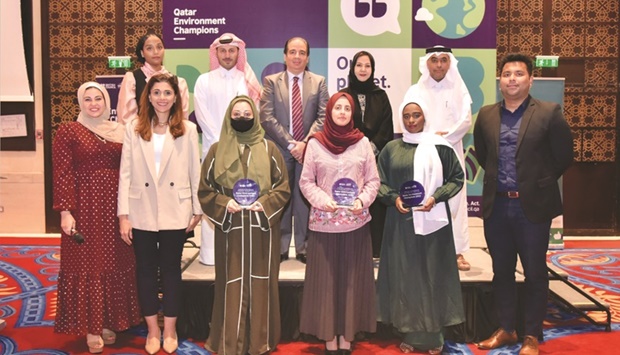 The participants with officials at the ceremony.