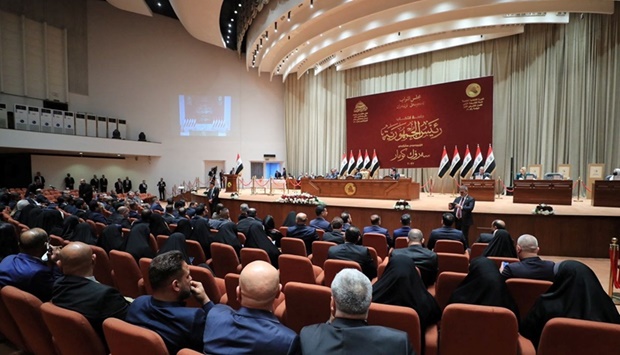 Lawmakers attend a session of the Iraqi parliament in Baghdad.