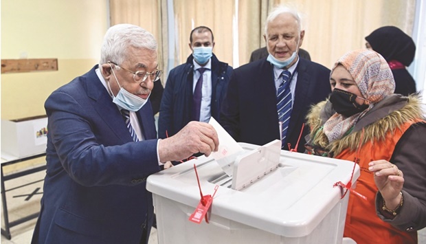 President Mahmud Abbas votes in the local elections in Ramallah in the occupied West Bank yesterday. (AFP)