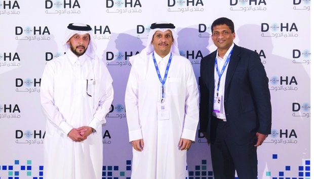 HE Sheikh Mohamed bin Abdulrahman al-Thani, Deputy Prime Minister and Foreign Minister of Qatar, Mansoor al-Mahmoud, chief executive of the QIA and Byju Raveendran, founder and chief executive of BYJUu2019S after signing the pact.