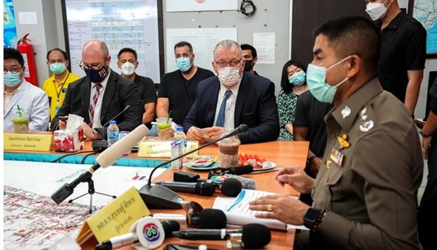 Thailand's Police Lieutenant General, Assistant Commissioner-General Surachate Hakparn, Australia's Ambassador to Thailand Allan McKinnon and associate of late Australian cricket player Shane Warne, Andrew Neophitou attend a news conference on Warne's death at Bophut police station in Koh Samui, Thailand. REUTERS