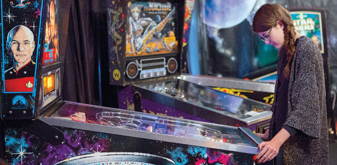 INTRIGUING: Bentje, a 14-year-old German, experiments with a Star Trek themed pinball machine that would have pleased her dad when he was young. Made 